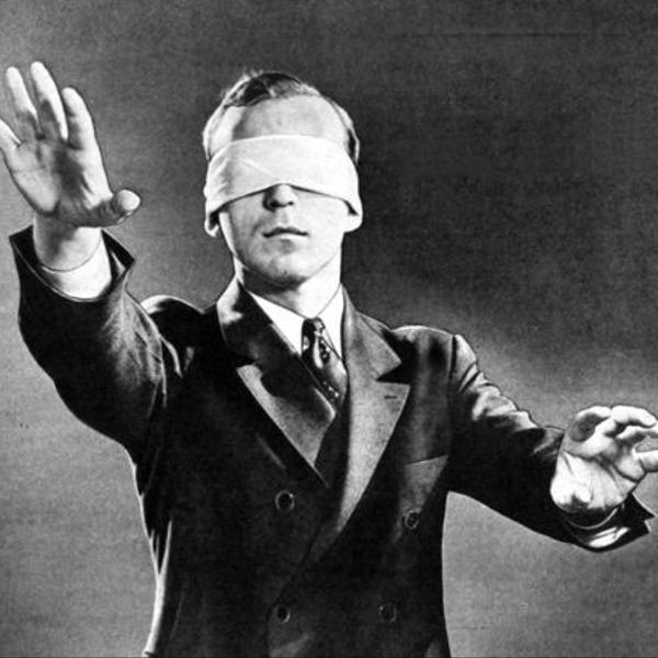 Blindfold man