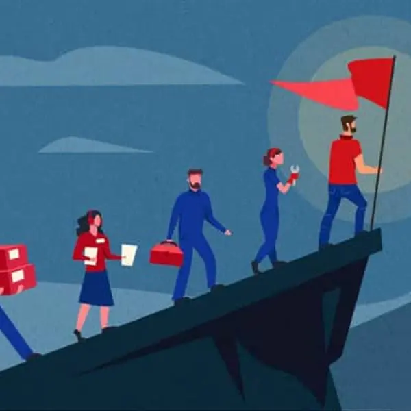 Cartoon of workers being led on a mountain