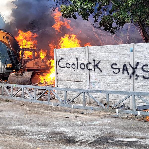 JCB burns after riot in Coolock Dublin