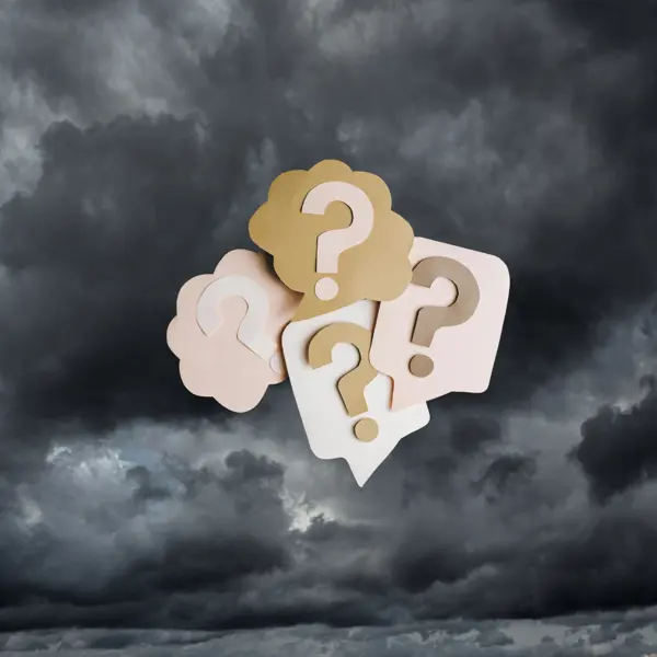 question marks and a storm cloud
